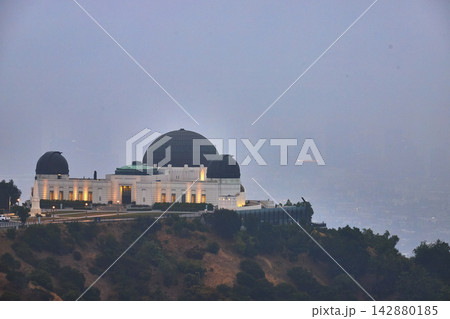 Griffith Observatory in Foggy Evening Light with Los Angeles Griffith Park Hills Griffith Observatory in Foggy Evening Light with Los Angeles Griffith Park Hills 142880185