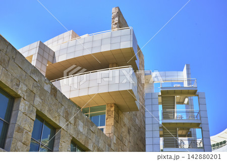 Modern Stone and White Metal Architecture at Getty Center under Blue Sky Modern Stone and White Metal Architecture at Getty Center under Blue Sky 142880201