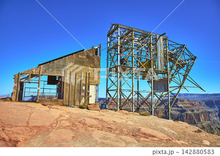 Abandoned Mine Structure and Weathered Building Overlooking Grand Canyon West Arizona Abandoned Mine Structure and Weathered Building Overlooking Grand Canyon West Arizona 142880583