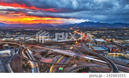 Aerial Las Vegas Spaghetti Bowl Highway Downtown Cityscape at Golden Hour 142881031