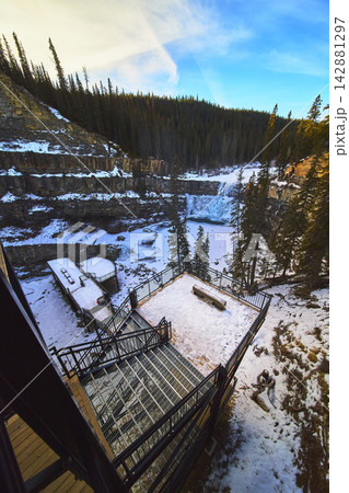 Winter Viewpoint Over Frozen Crescent Falls and Forested Canyon in Alberta Winter Viewpoint Over Frozen Crescent Falls and Forested Canyon in Alberta 142881297