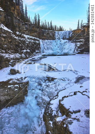 Frozen Waterfall and Snowy Canyon in Winter Wilderness Frozen Waterfall and Snowy Canyon in Winter Wilderness 142881481