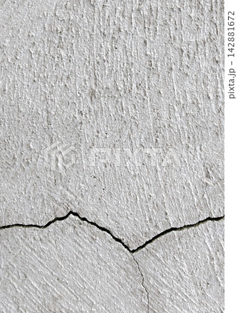 Cracked gray concrete surface background Cracked gray concrete surface background 142881672