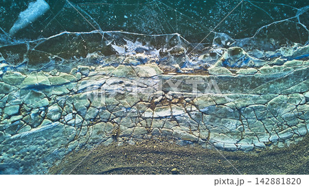 Aerial Frozen Lake Cracked Ice Texture Top Down Winter Nature Aerial Frozen Lake Cracked Ice Texture Top Down Winter Nature 142881820