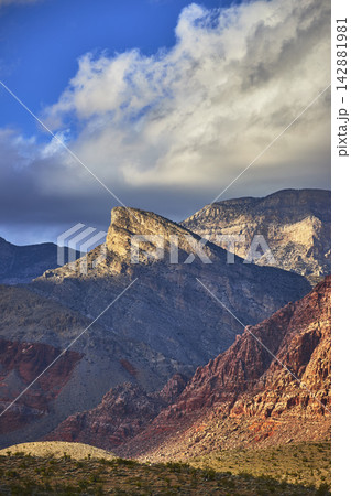 Turtlehead Peak Red Rock Canyon Dramatic Winter Clouds and Sunlit Desert Landscape Turtlehead Peak Red Rock Canyon Dramatic Winter Clouds and Sunlit Desert Landscape 142881981