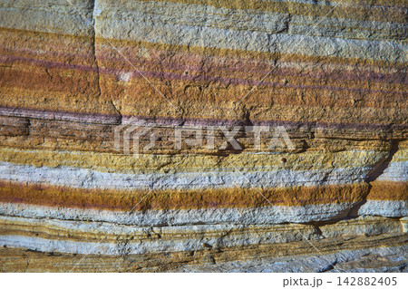Colorful Sandstone Layers and Textured Rock Surface Valley of Fire Nevada Colorful Sandstone Layers and Textured Rock Surface Valley of Fire Nevada 142882405