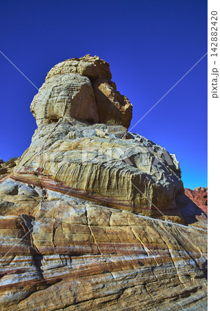 Layered Sandstone Formation Under Clear Blue Sky Nevada Desert Layered Sandstone Formation Under Clear Blue Sky Nevada Desert 142882420