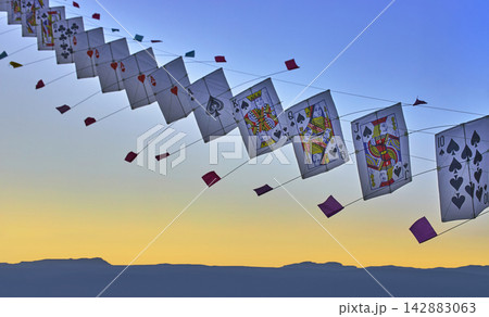 Kite Festival Playing Cards in Sky with Mountains at Golden Hour Las Vegas Nevada Kite Festival Playing Cards in Sky with Mountains at Golden Hour Las Vegas Nevada 142883063