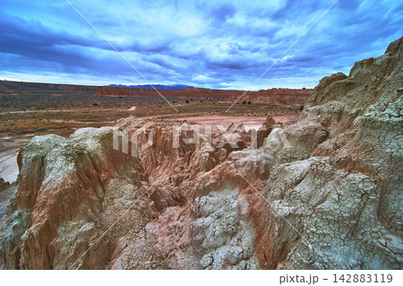 Cathedral Gorge Slot Formations and Desert Landscape Under Dramatic Sky Nevada Cathedral Gorge Slot Formations and Desert Landscape Under Dramatic Sky Nevada 142883119