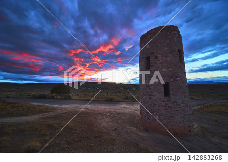 Cathedral Gorge CCC Water Tower at Sunset with Pink Clouds in Nevada Desert 142883268