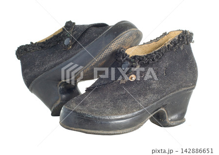 Old vintage traditional womans shoes isolated with clipping path. 142886651