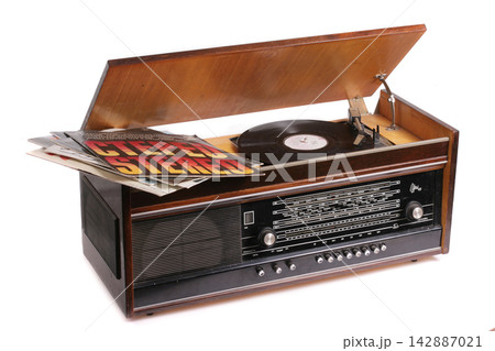 Vintage vinyl record player on a white background Vintage vinyl record player on a white background 142887021