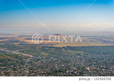 Panoramic view of Pyatigorsk on a summer day, resort town in Stavropol region, Russia. Russia. View from the top of Mount Mashuk in Pyatigorsk, Panoramic view of Pyatigorsk on a summer day, resort town in Stavropol region, Russia. Russia. View from the top of Mount Mashuk in Pyatigorsk, 142888700
