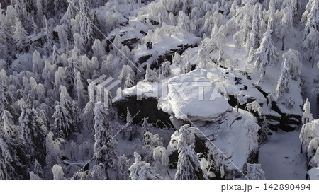Frozen Mountain Ledges Panorama. Frozen Landscape Showcasing Snowcovered Rocks And Frosted Trees. Media Frozen Mountain Ledges Panorama. Frozen Landscape Showcasing Snowcovered Rocks And Frosted Trees. Media 142890494