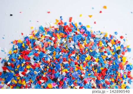 Plastic colorful pieces recycling shredded for industrial use. 142890540