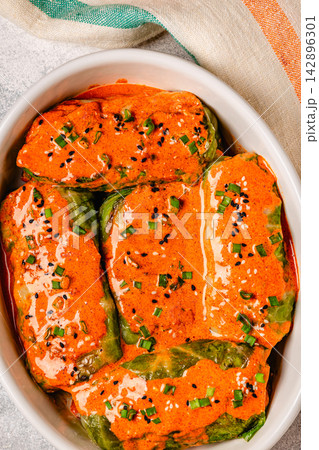 Fresh stuffed coconut curry cabbage rolls Fresh stuffed coconut curry cabbage rolls 142896301