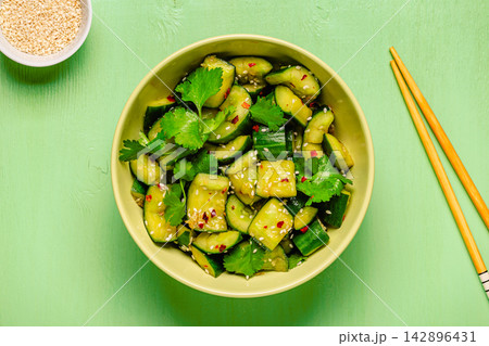 Chinese smashed cucumber salad with sesame Chinese smashed cucumber salad with sesame 142896431