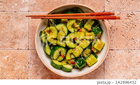 Chinese smashed cucumber salad with sesame Chinese smashed cucumber salad with sesame 142896432