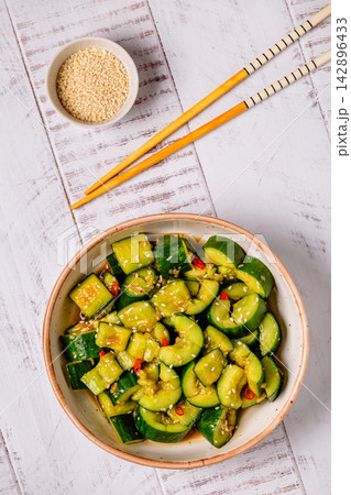 Chinese smashed cucumber salad with sesame Chinese smashed cucumber salad with sesame 142896433