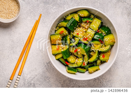 Chinese smashed cucumber salad with sesame 142896436