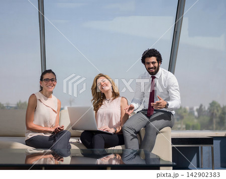 Middle Eastern modern corporate team in a casual business meeting discussing ideas and collaboration in an office lounge Middle Eastern modern corporate team in a casual business meeting discussing ideas and collaboration in an office lounge 142902383