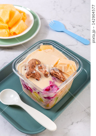 melon Yogurt Fruit Dessert with Mixed Fresh Ingredients 142904577