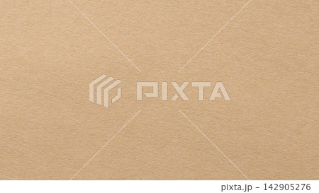 Beige paper texture background with fine grain across a blank matte surface in a warm tan color Beige paper texture background with fine grain across a blank matte surface in a warm tan color 142905276