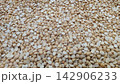 Top view background texture of raw dried yellow split peas 142906233