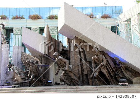 Warsaw Uprising Monument with bronze soldier sculptures in Poland. Warsaw Uprising Monument with bronze soldier sculptures in Poland. 142909307