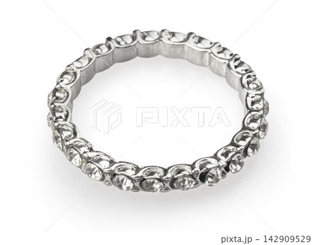 Diamond eternity band ring on white background Diamond eternity band ring on white background 142909529