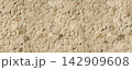 Stone wall surface creating a rustic texture background 142909608