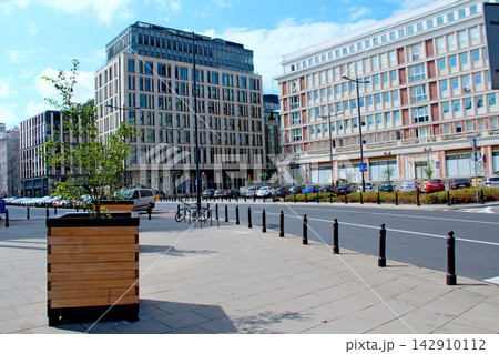 Plac Powstancow Warszawy square and modern buildings in Warsaw city. Plac Powstancow Warszawy square and modern buildings in Warsaw city. 142910112