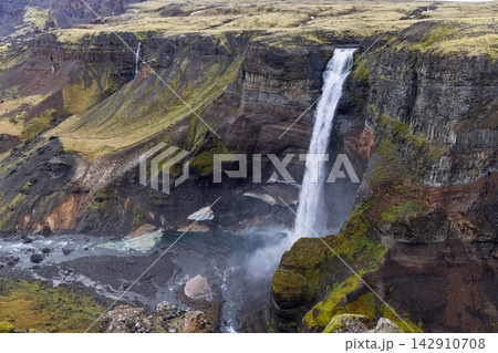 Haifoss and the Fossa River in a layered canyon at Thjorsardalur, Iceland Haifoss and the Fossa River in a layered canyon at Thjorsardalur, Iceland 142910708