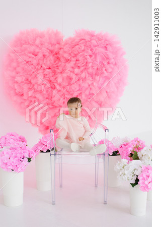 Little Child in Pink Dress in Photo Studio Little Child in Pink Dress in Photo Studio 142911003