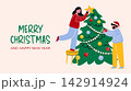 Happy young couple decorating a Christmas tree with ornaments and a star. Banner with Merry Christmas and Happy New Year text for holiday greeting cards. 142914924