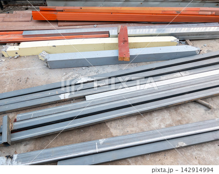 Stacked Metal Beams at Construction Site Stacked Metal Beams at Construction Site 142914994
