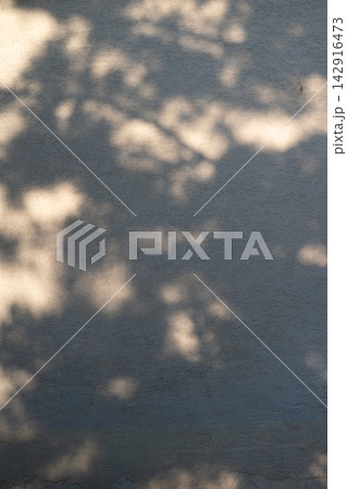 Abstract Light and Shadows on Concrete Wall, Minimalist Atmospheric Background. Abstract Light and Shadows on Concrete Wall, Minimalist Atmospheric Background. 142916473