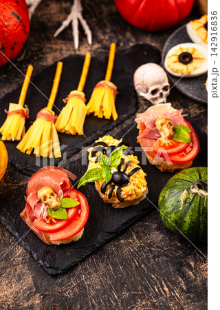 Halloween appetizers. Assortment of snack, food, party buffet Halloween appetizers. Assortment of snack, food, party buffet 142916836