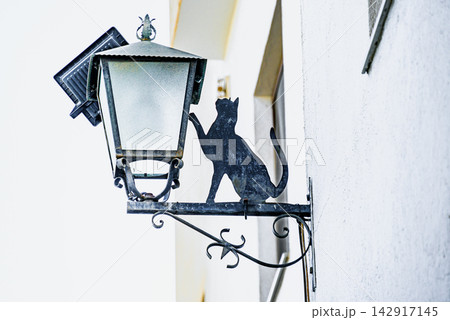 An antique-style streetlamp with ornamental details on the streets of Andalusia. Soportujar, Alpujarra, Granada An antique-style streetlamp with ornamental details on the streets of Andalusia. Soportujar, Alpujarra, Granada 142917145