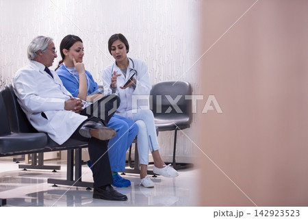 Medical team meeting at a modern Middle Eastern eye hospital clinic in Egypt discussing surgery Medical team meeting at a modern Middle Eastern eye hospital clinic in Egypt discussing surgery 142923523
