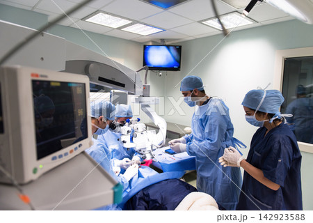 Eye surgery team performing ophthalmic operation in a modern Middle Eastern hospital clinic in Egypt 142923588