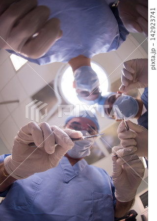 Eye hospital surgery team performing operation in a modern Middle Eastern clinic in Egypt Eye hospital surgery team performing operation in a modern Middle Eastern clinic in Egypt 142923741