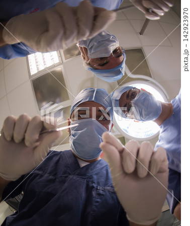 Eye surgery team of Middle Eastern doctors performing operation in a small clinic in Egypt Eye surgery team of Middle Eastern doctors performing operation in a small clinic in Egypt 142923970