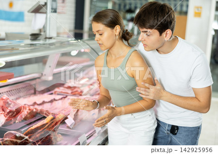 couple carefully selects their choice couple carefully selects their choice 142925956