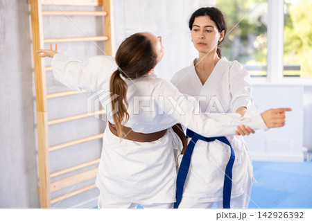 Karate practitioners showcase their techniques Karate practitioners showcase their techniques 142926392