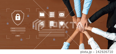 Collaborative Teamwork with Digital Security Elements Displayed on Wooden Desk for Cybersecurity and Data Protection Concepts Cyphers. 142926710