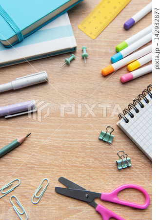 Colorful school and office supplies on wooden desk Colorful school and office supplies on wooden desk 142932877