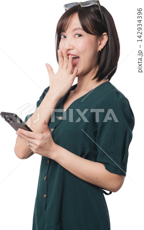 Surprised asian woman holding mobile phone using artificial intelligence chatbot app with excited happy face expression isolated on transparency background background studio shot Surprised asian woman holding mobile phone using artificial intelligence chatbot app with excited happy face expression isolated on transparency background background studio shot 142934396