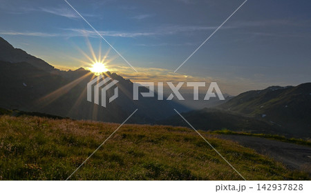 sunset in mountains 142937828