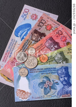 Brunei paper money, dollar banknotes and sen coins as currency for exchange or travel. Brunei money 142938288